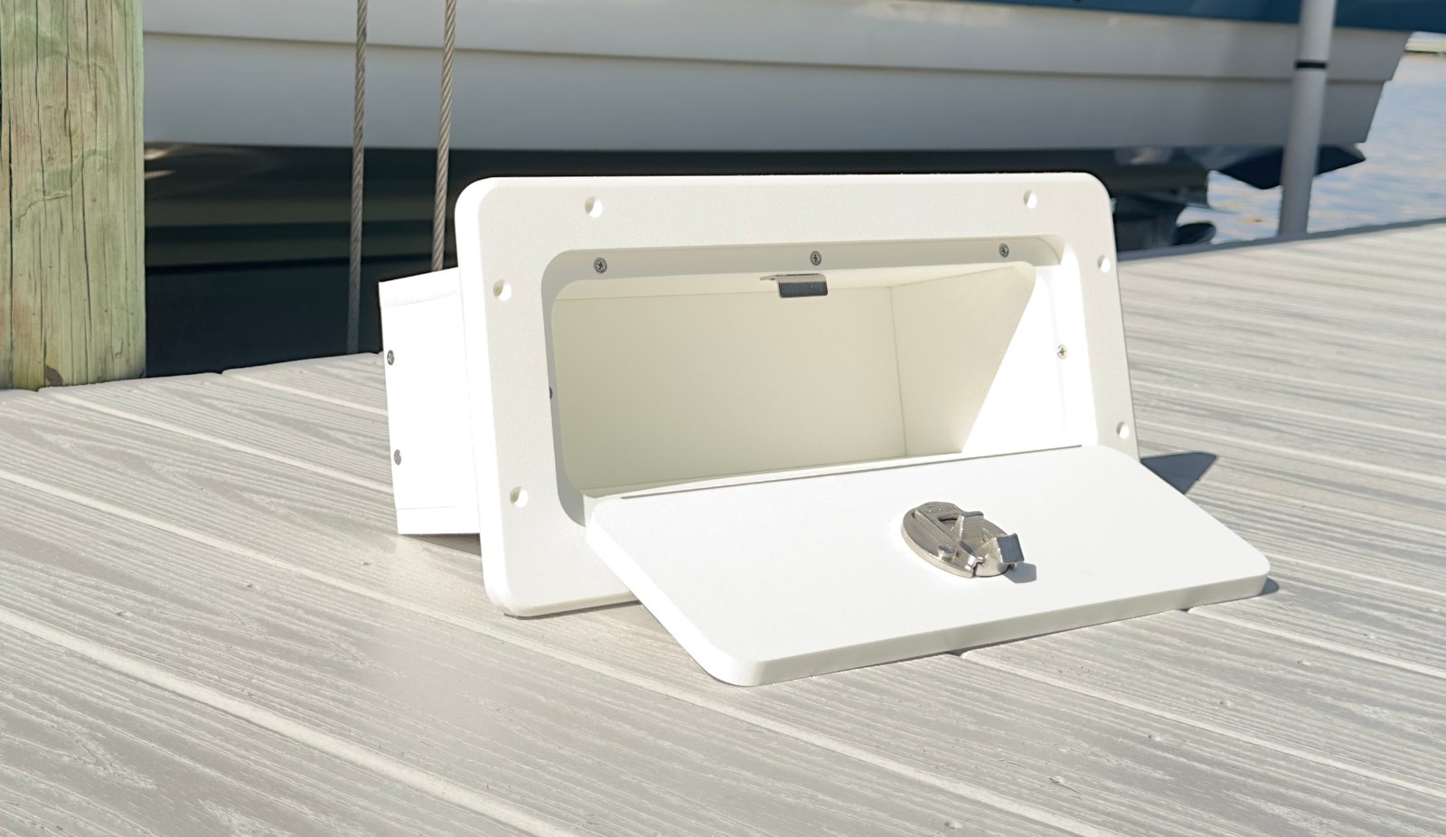 Open Tarpon Bay Marine storage box showing hinge, latch, and interior